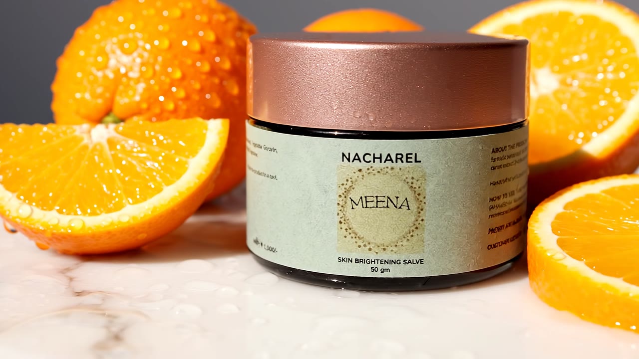 Meena Skin Brightening Salve 50 gm surrounded by orange slices