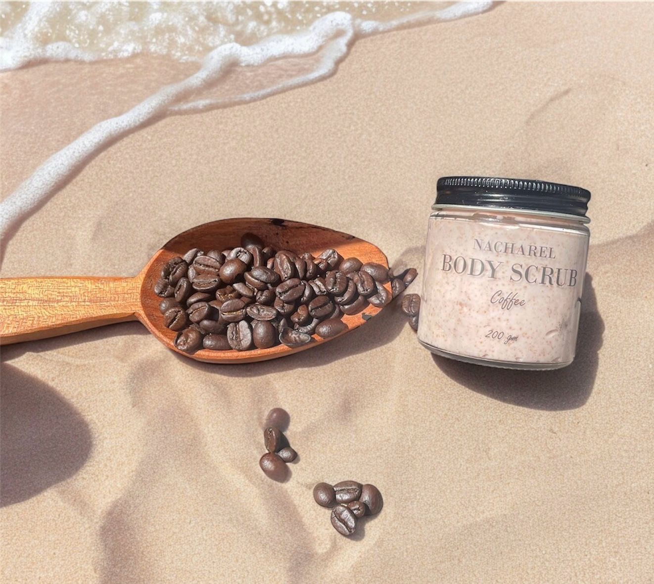 Nacharel Coffee Body Oil bottle on a marble surface with Arabica coffee beans - Natural Anti-Cellulite and Deep Hydration Treatment in Delhi