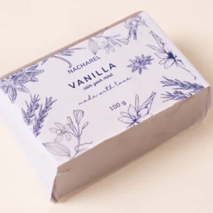 Handmade vanilla soap bar with organic botanical oils for deep skin hydration.